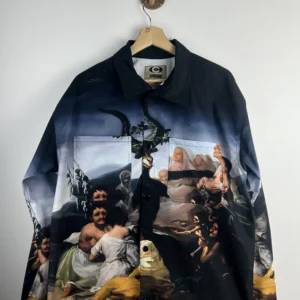 Jacket with a renaissance painting of a goat like entity and people in despair.